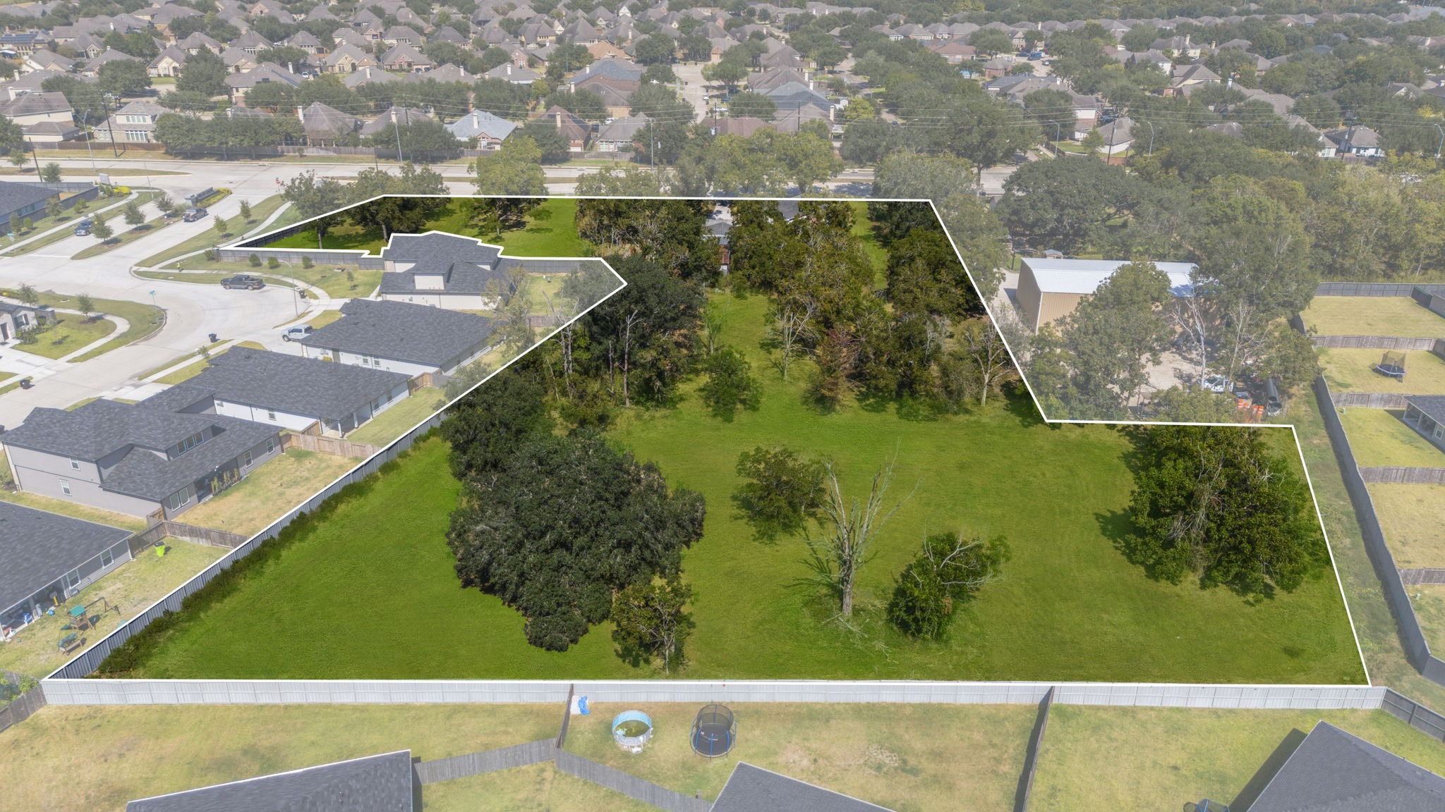 5418 Bryan Road Rosenberg, TX 77469 - Photo 14 of 49 view of a back yard