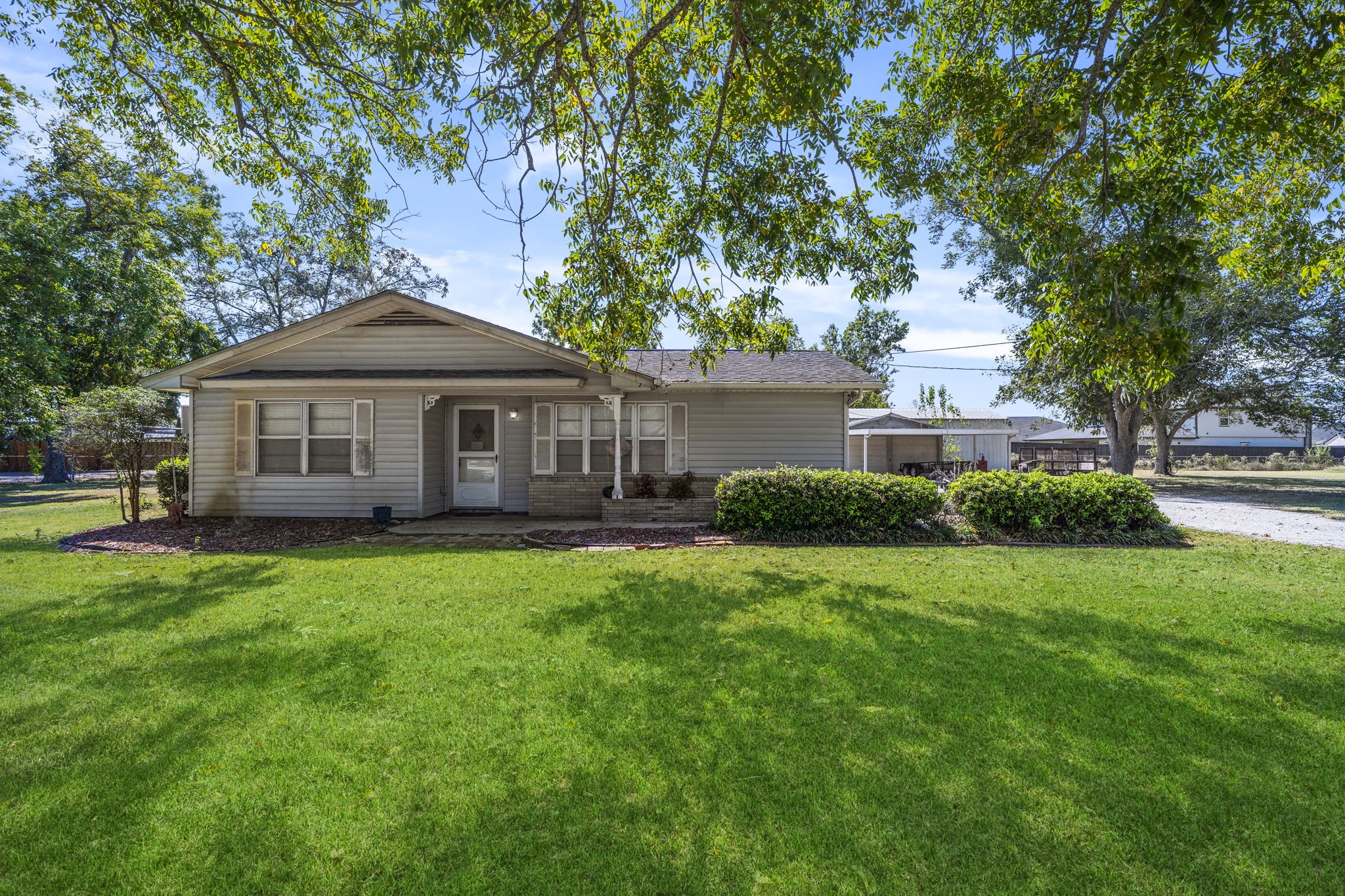 5418 Bryan Road Rosenberg, TX 77469 - Photo 15 of 49 a front of a house with a garden