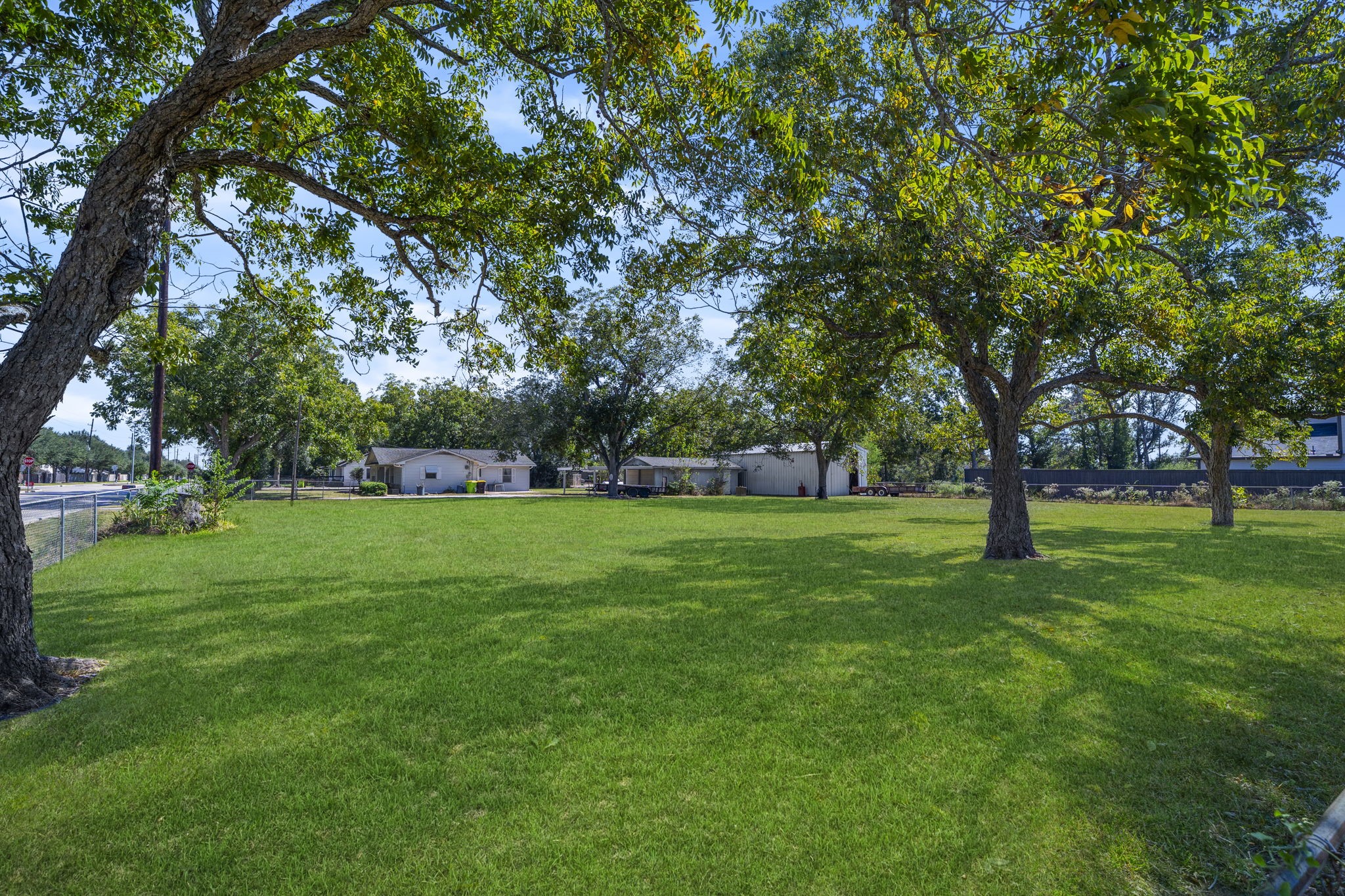 5418 Bryan Road Rosenberg, TX 77469 - Photo 30 of 49 a huge green field with lots of trees