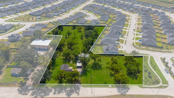 a view of swimming pool with a yard