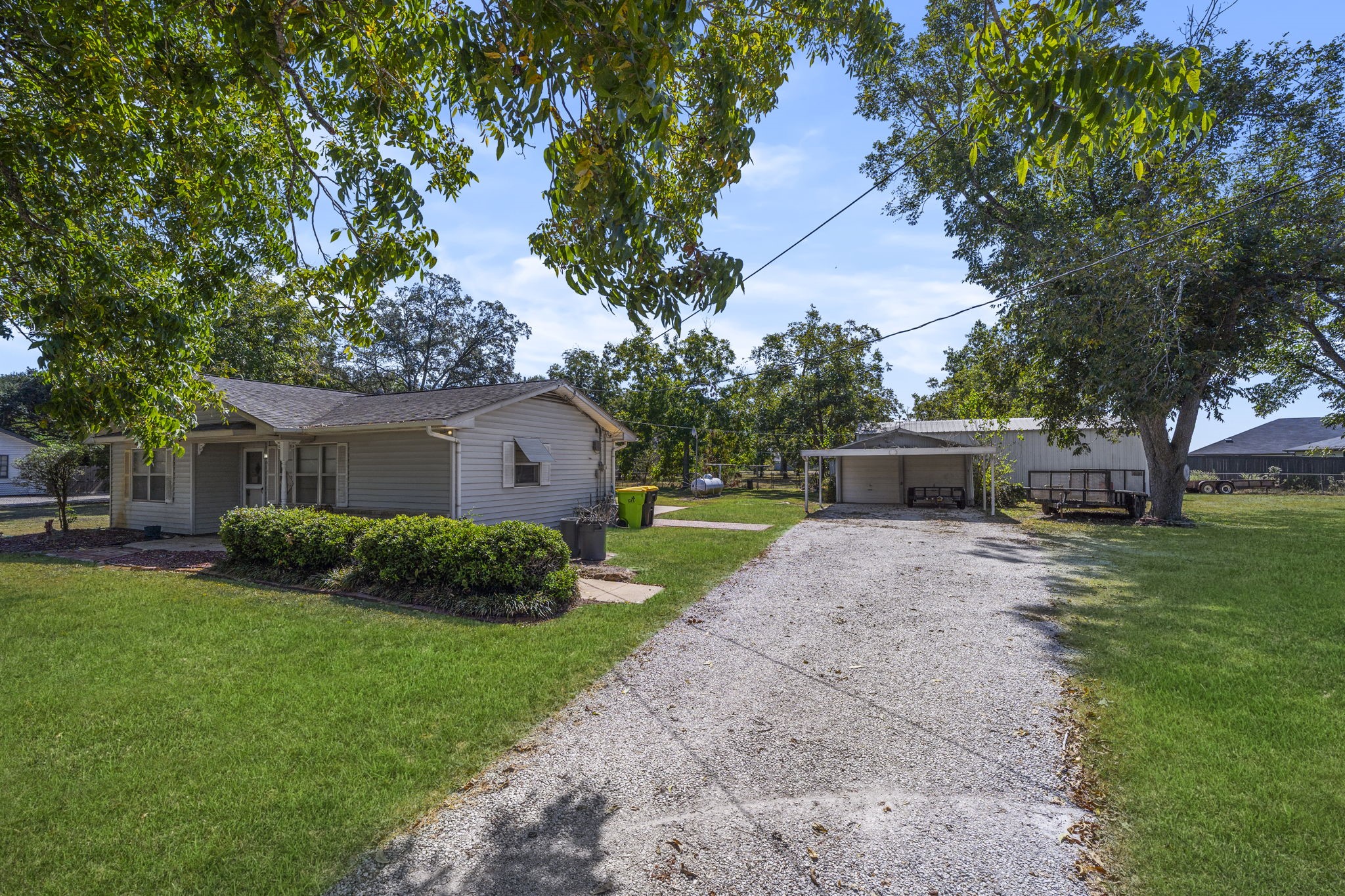 5418 Bryan Road Rosenberg, TX 77469 - Photo 31 of 49 a front view of a house with garden
