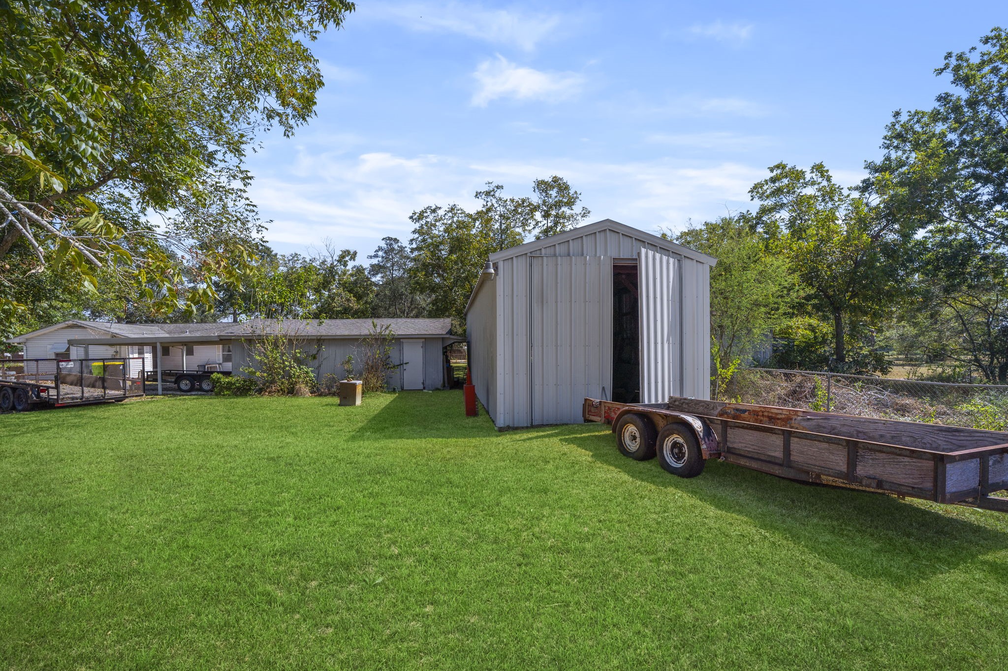 5418 Bryan Road Rosenberg, TX 77469 - Photo 35 of 49 a view of a backyard with garden and plants