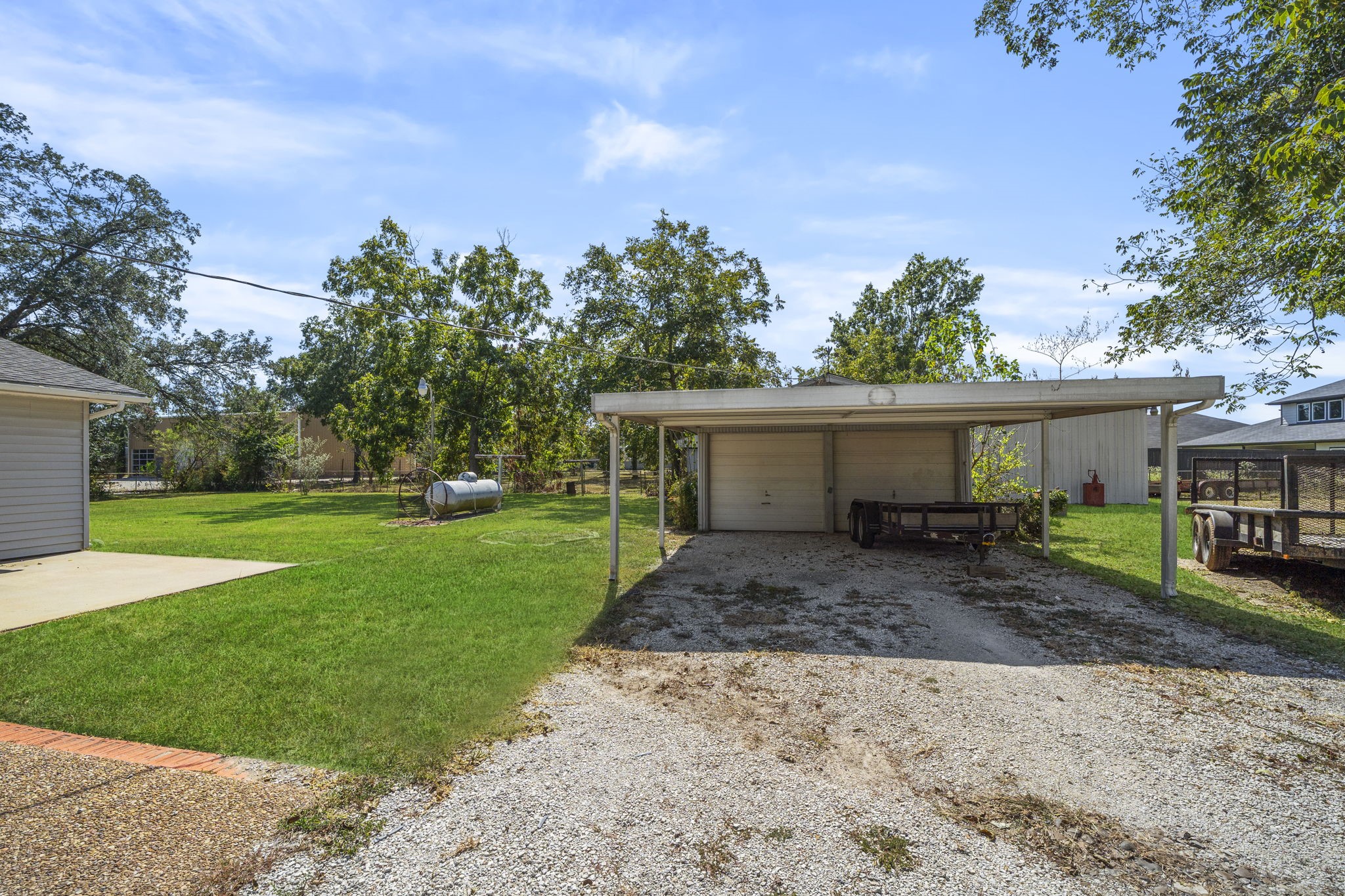 5418 Bryan Road Rosenberg, TX 77469 - Photo 37 of 49 a view of a house with backyard space