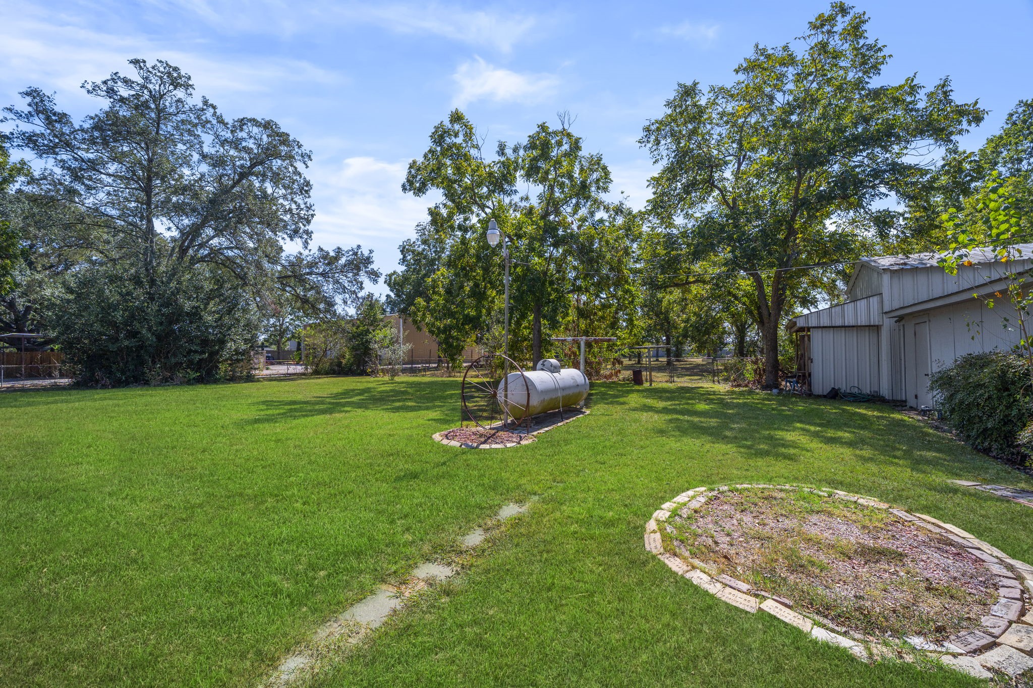 5418 Bryan Road Rosenberg, TX 77469 - Photo 38 of 49 a garden view with a seating space