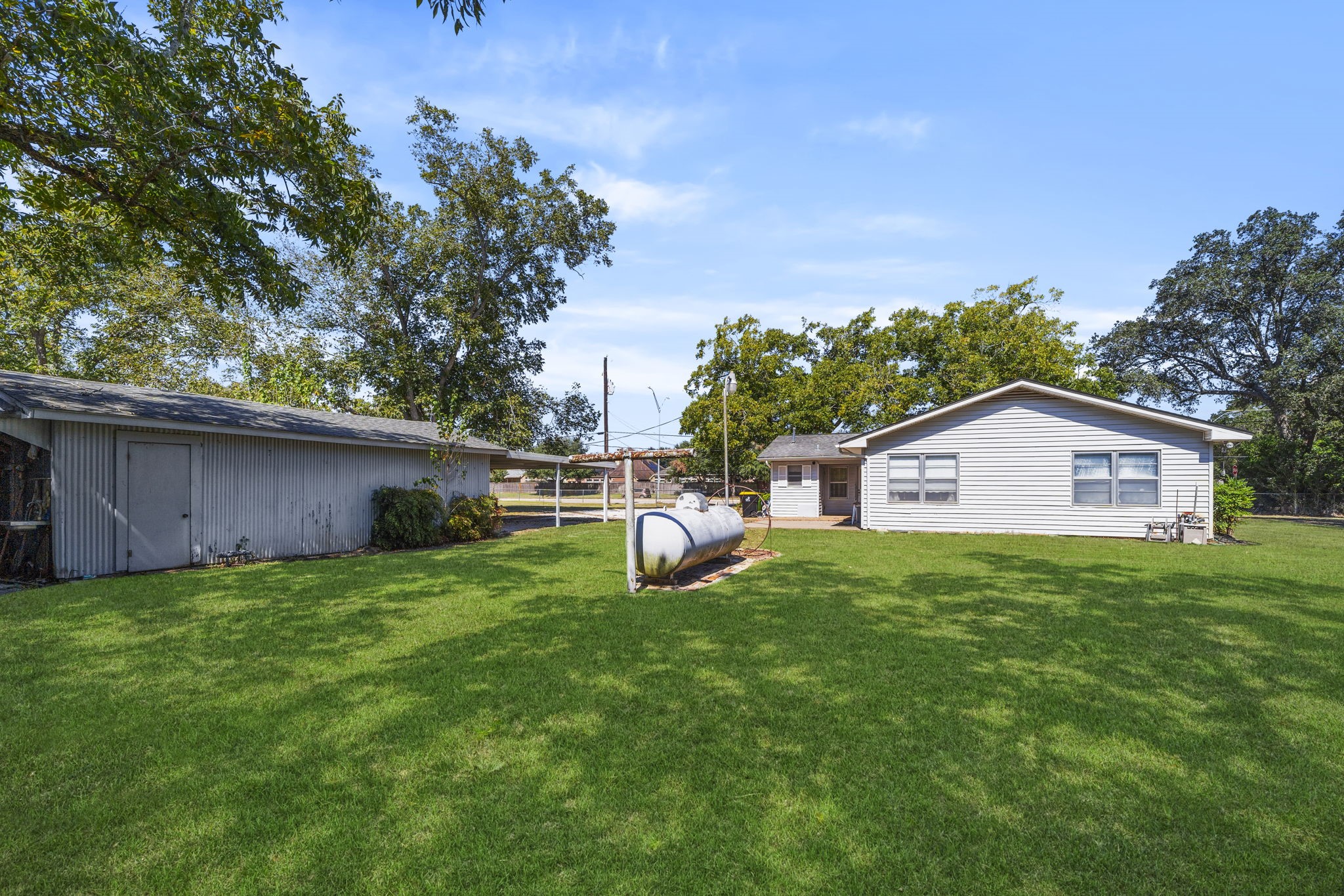 5418 Bryan Road Rosenberg, TX 77469 - Photo 40 of 49 a view of a yard with an outdoor space