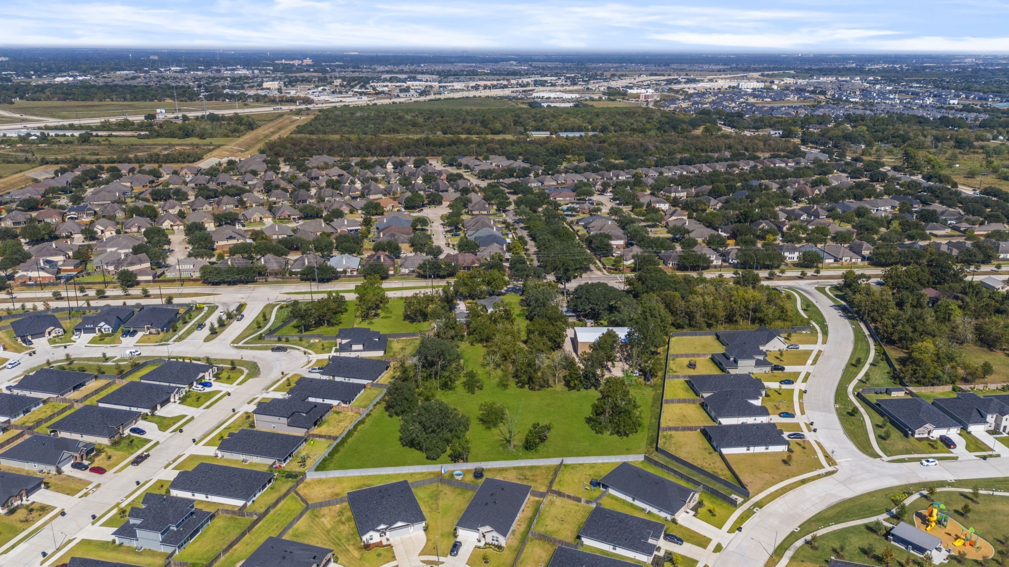 5418 Bryan Road Rosenberg, TX 77469 - Photo 4 of 49 an aerial view of residential building and lake