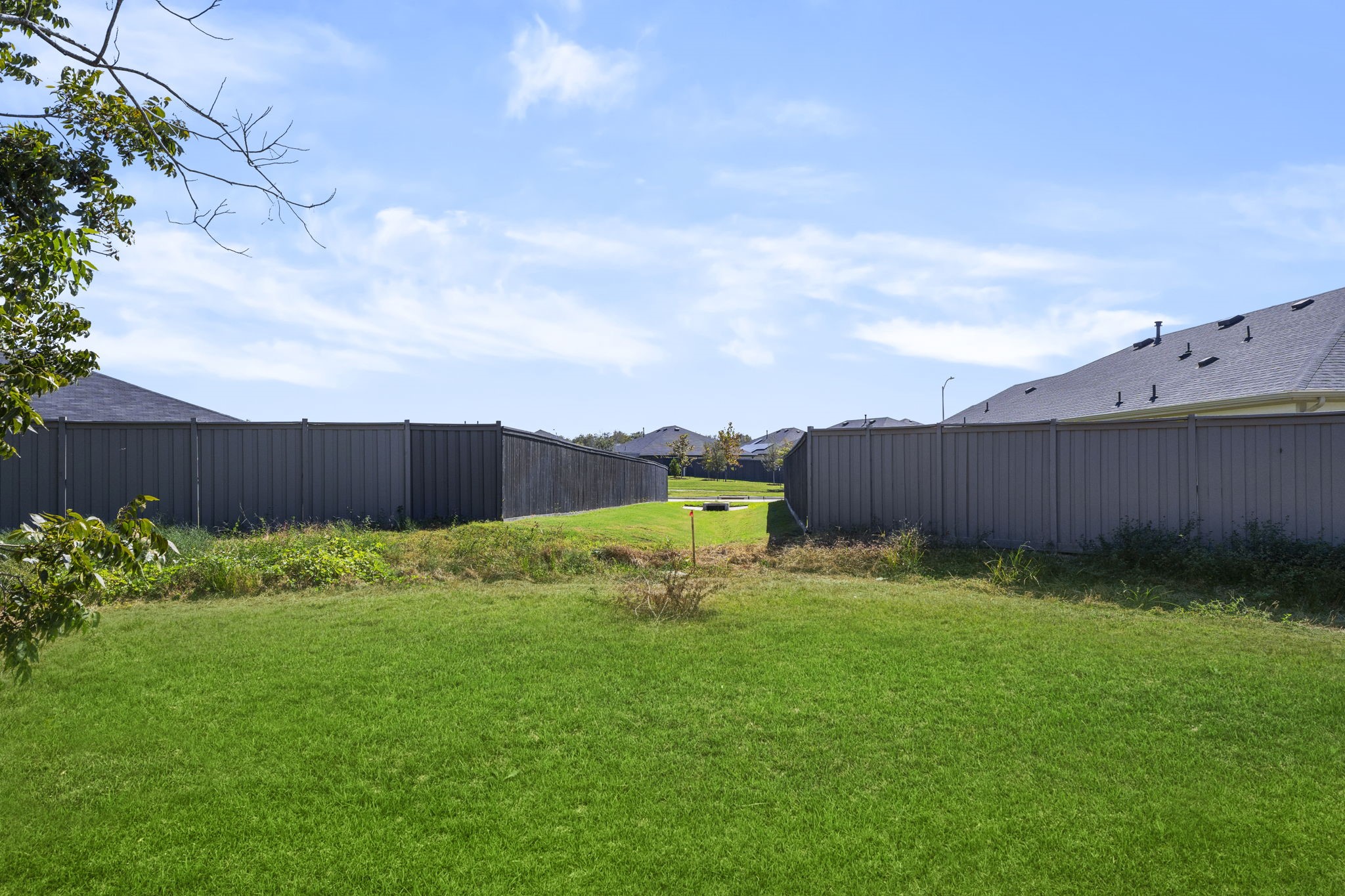 5418 Bryan Road Rosenberg, TX 77469 - Photo 46 of 49 a backyard of a house with lots of green space