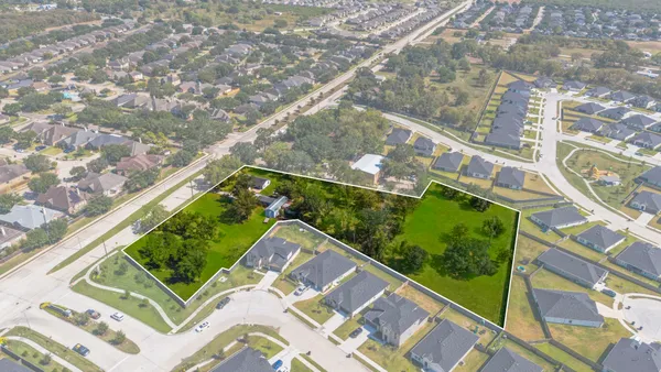 a view of swimming pool with a yard