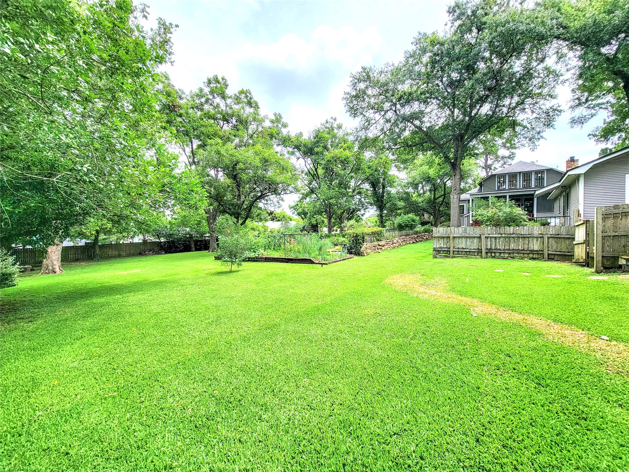 1406 Key Street Brenham, TX 77833 - Photo 34 of 50 Enjoy stunning backyard views of a historic landmark, preserving its timeless charm & beauty