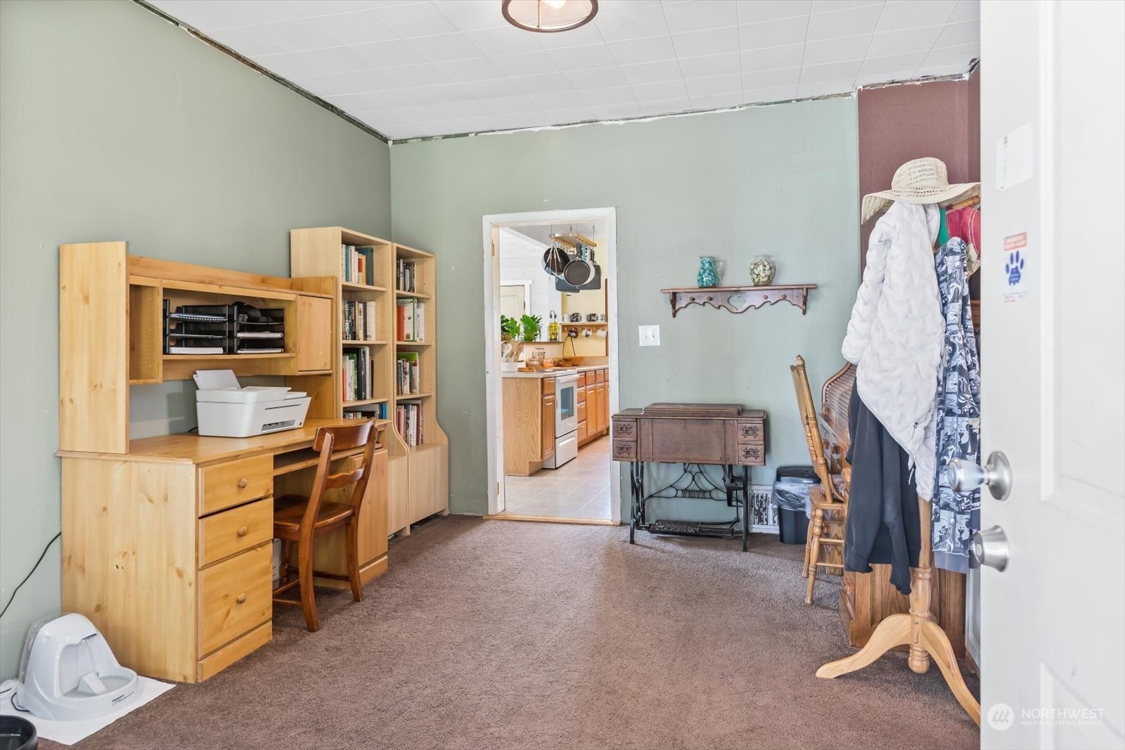 1306 38th Street Everett, WA 98201 - Photo 12 of 37 a bedroom with furniture and a lamp