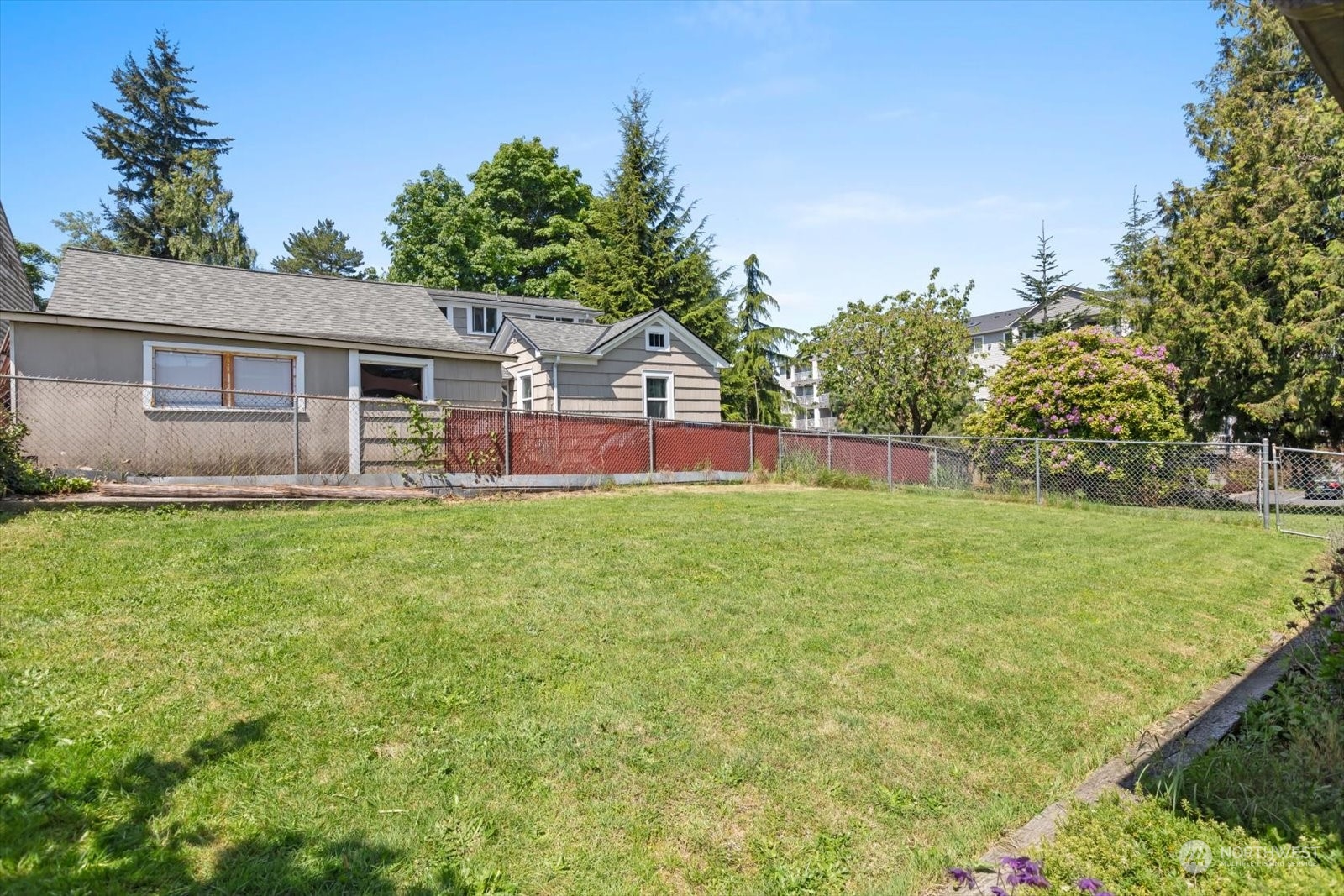 1306 38th Street Everett, WA 98201 - Photo 29 of 37 a view of a house with a backyard