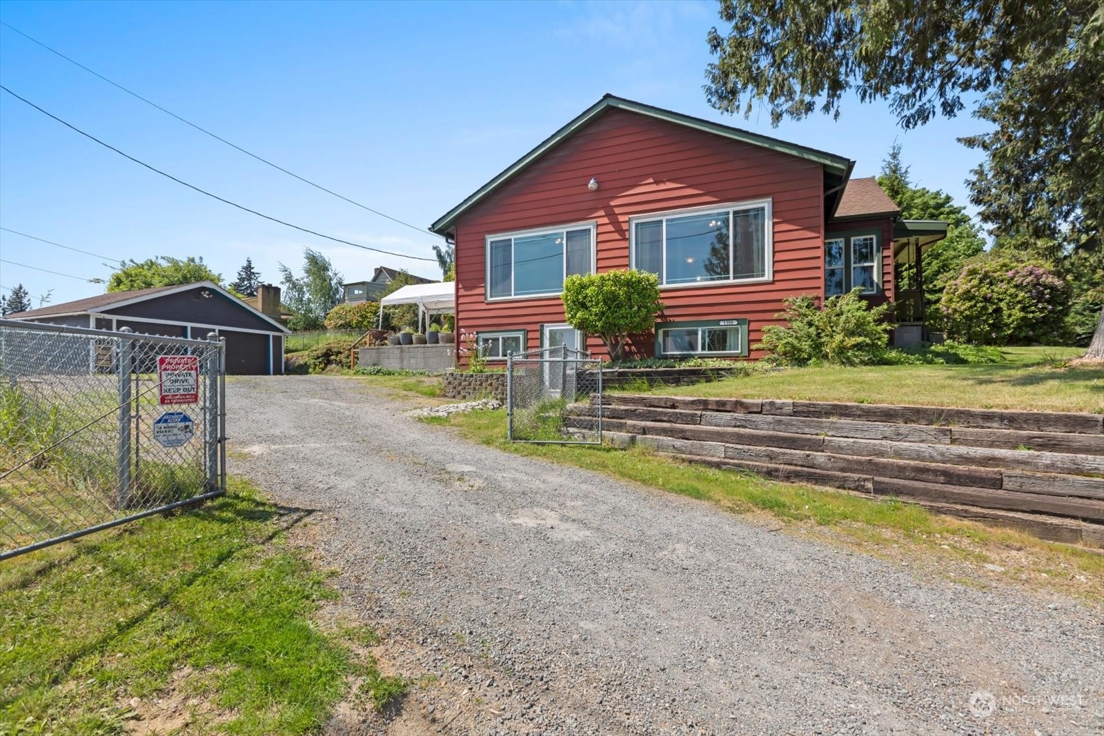 1306 38th Street Everett, WA 98201 - Photo 32 of 37 a front view of a house with a yard