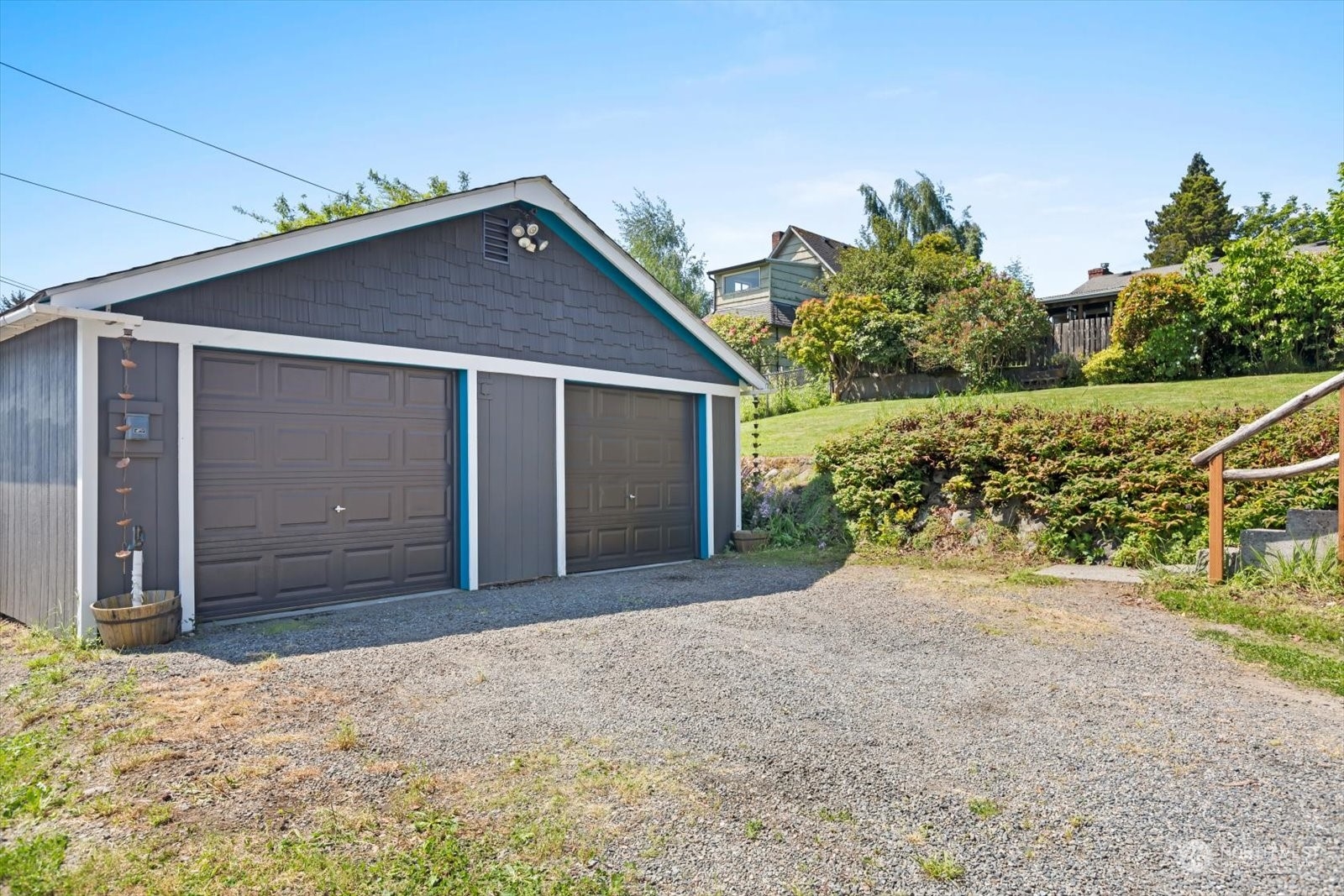 1306 38th Street Everett, WA 98201 - Photo 34 of 37 a view of a house with a yard and garage
