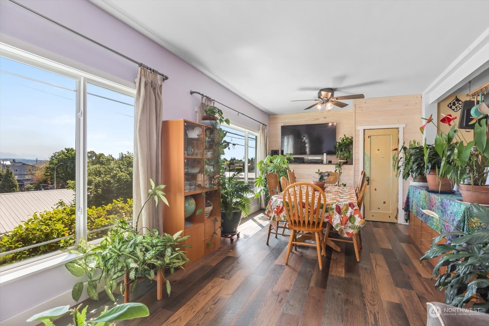1306 38th Street Everett, WA 98201 - Photo 5 of 37 a view of a dining room with furniture window and wooden floor