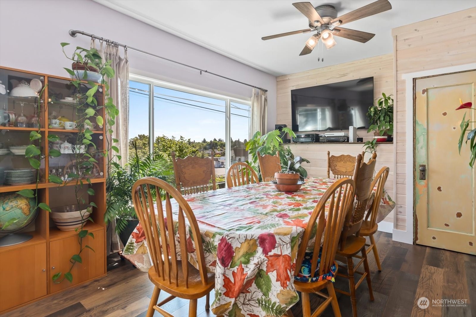 1306 38th Street Everett, WA 98201 - Photo 7 of 37 a view of a dining room with furniture window and wooden floor
