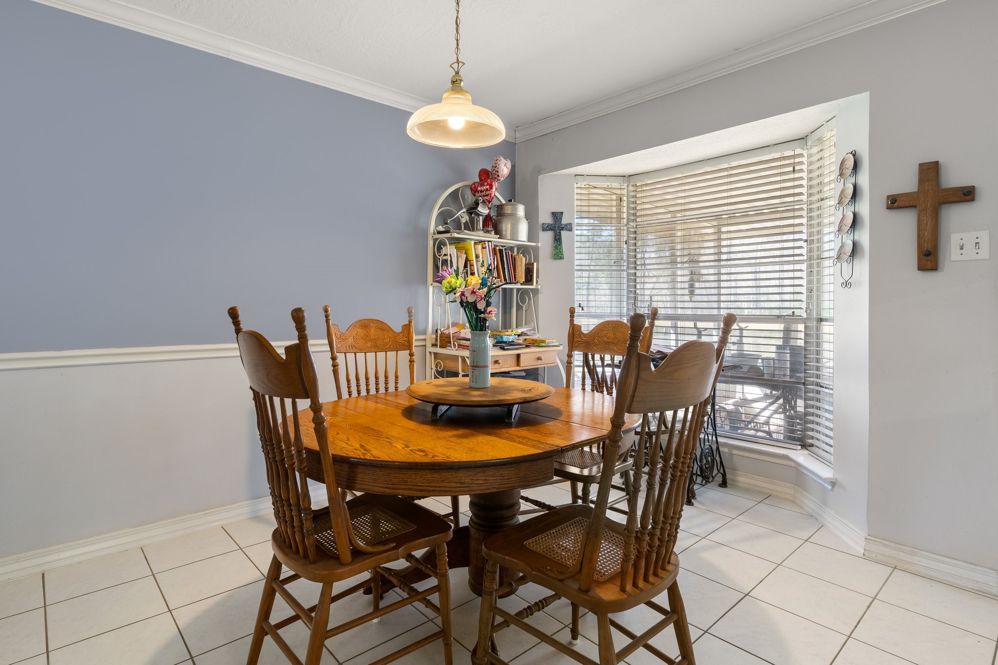 12156 Crockett Martin Road Conroe, TX 77306 - Photo 24 of 45 a dining room with furniture and window