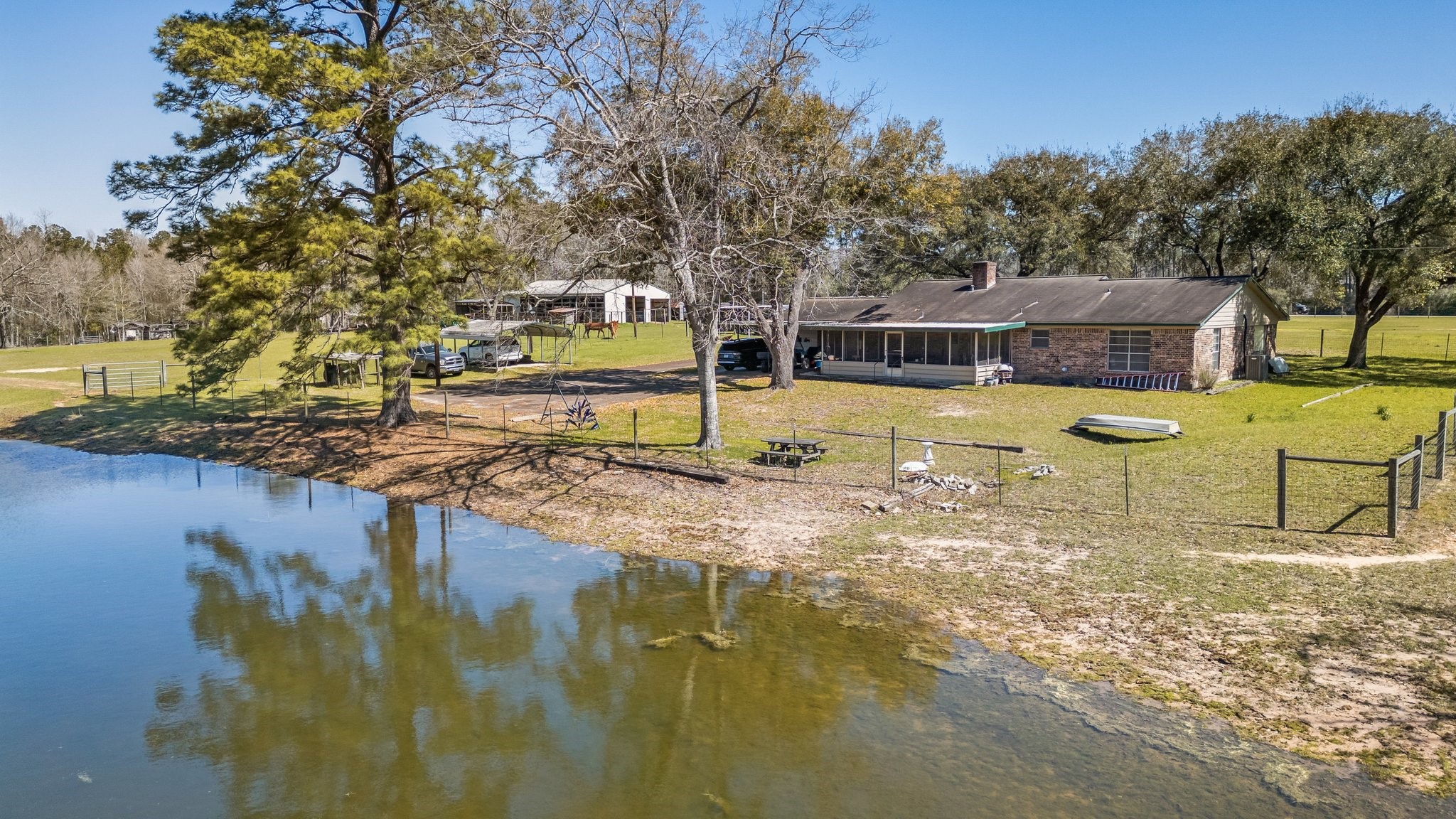 12156 Crockett Martin Road Conroe, TX 77306 - Photo 35 of 45 a view of a house with pool