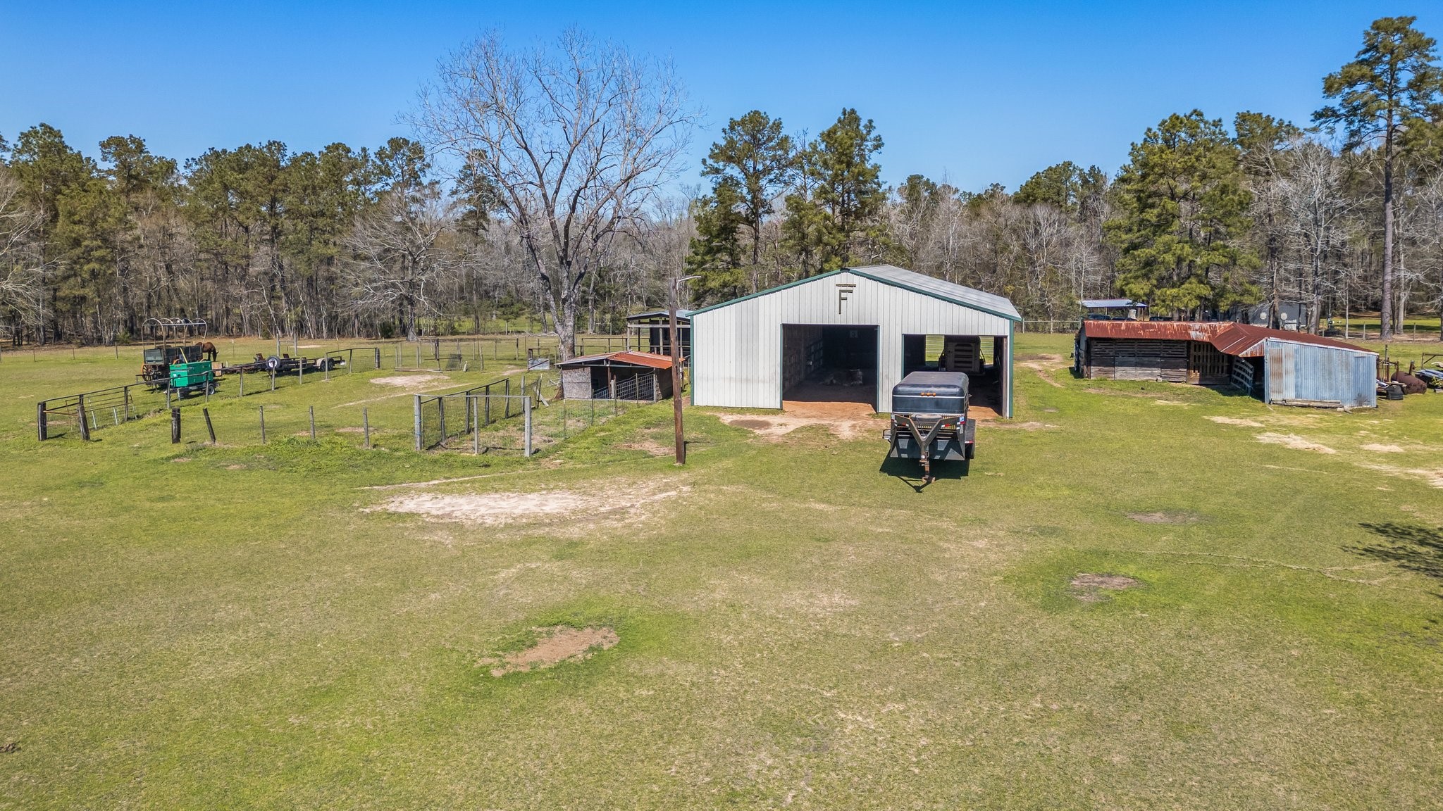 12156 Crockett Martin Road Conroe, TX 77306 - Photo 37 of 45 a swimming pool view with a seating space