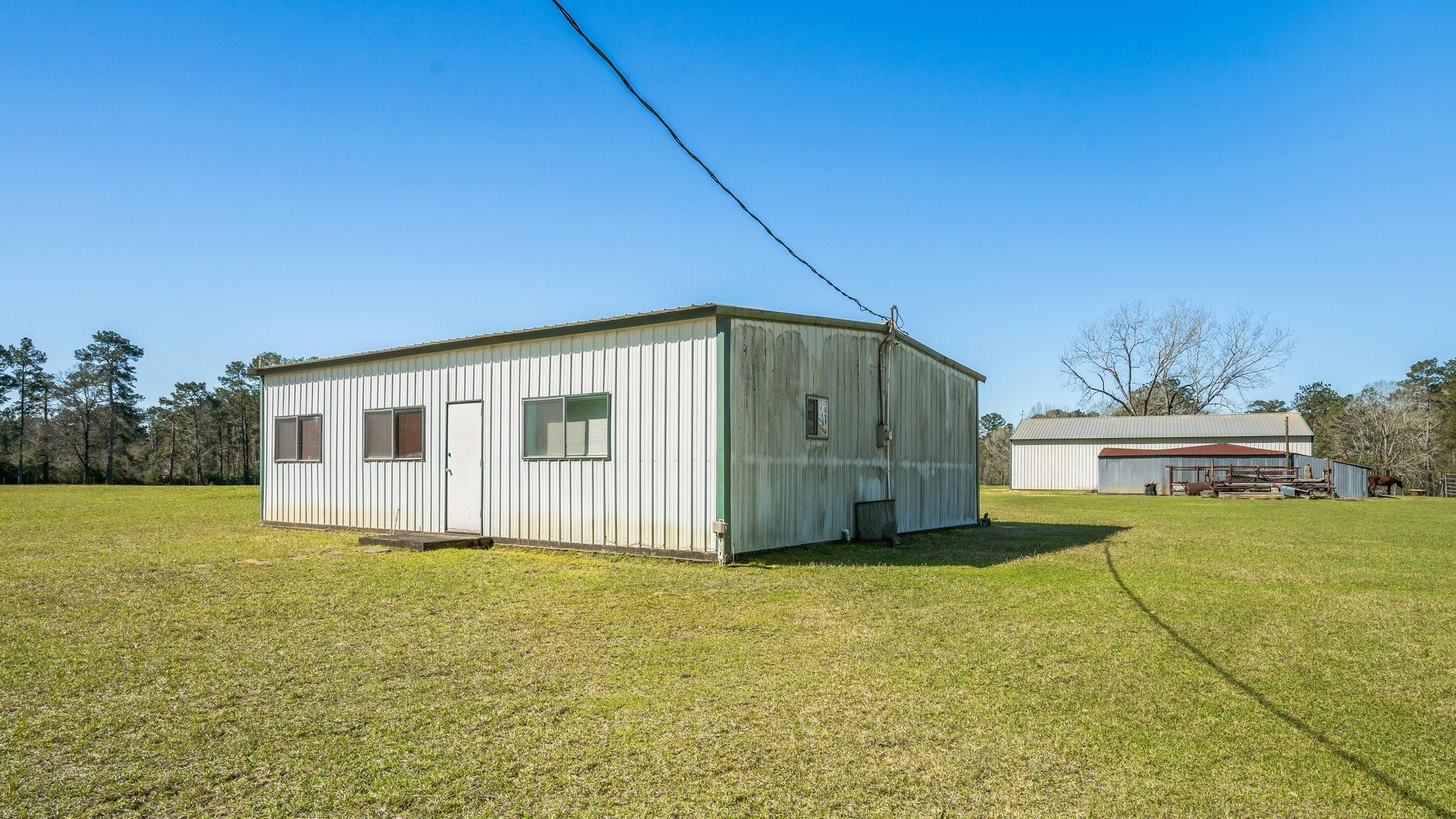 12156 Crockett Martin Road Conroe, TX 77306 - Photo 41 of 45 a house view with garden space