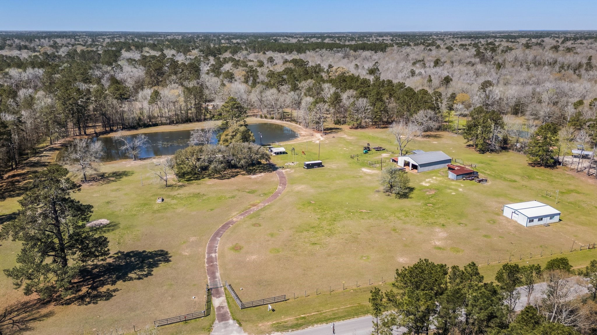 12156 Crockett Martin Road Conroe, TX 77306 - Photo 6 of 45 a view of swimming pool and mountain in the back