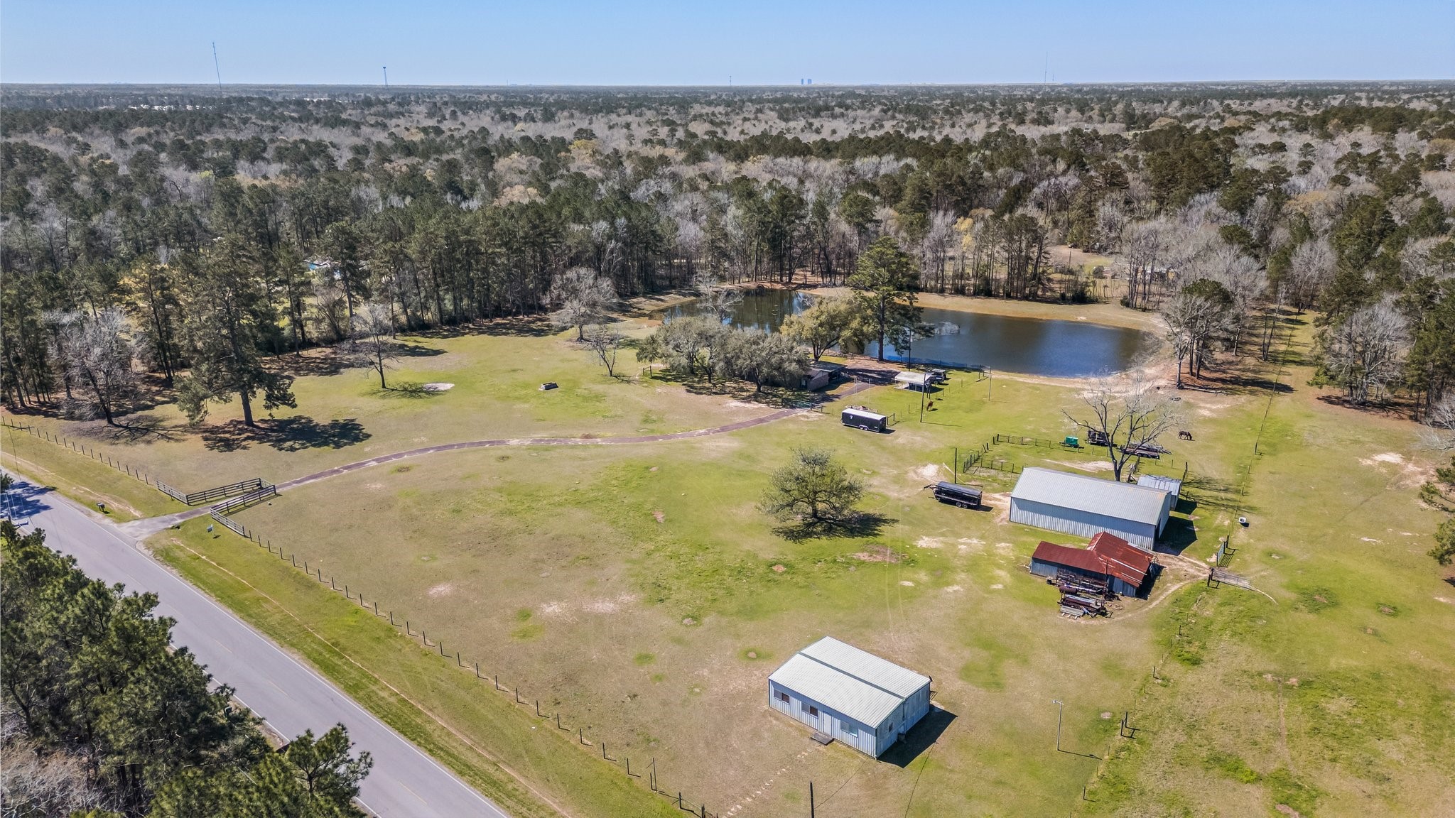 12156 Crockett Martin Road Conroe, TX 77306 - Photo 7 of 45 swimming pool view with a sitting space