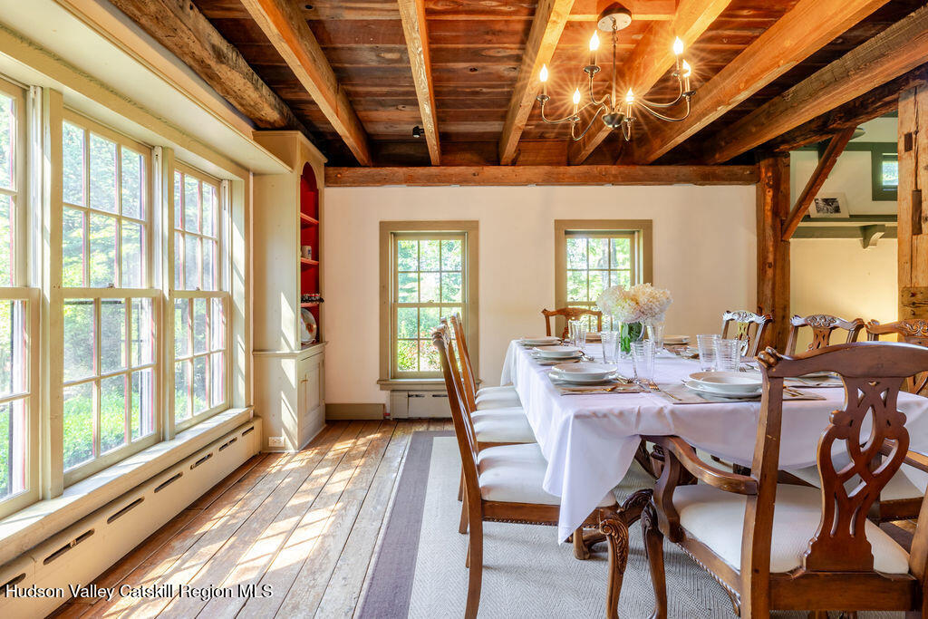 455 Post Hill Road Craryville, NY 12521 - Photo 11 of 53 a view of a dining room with furniture window and outside view
