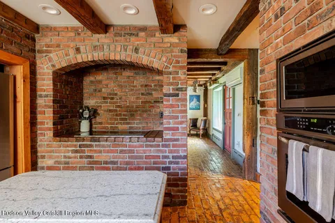 a front view of a house with wooden floor