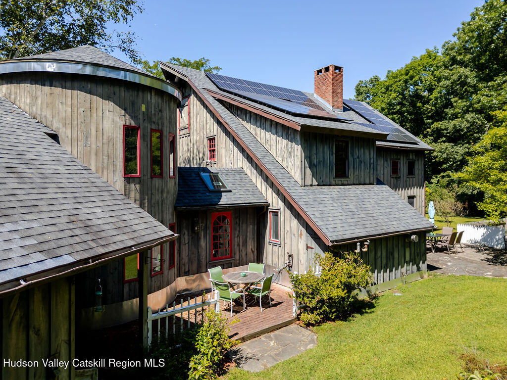 455 Post Hill Road Craryville, NY 12521 - Photo 4 of 53 a backyard of a house with seating space