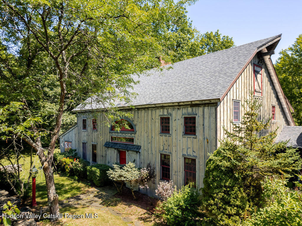 455 Post Hill Road Craryville, NY 12521 - Photo 43 of 53 a front view of house with a garden