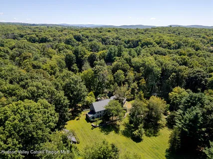a picture of a cabinet with a white wall and a white wall
