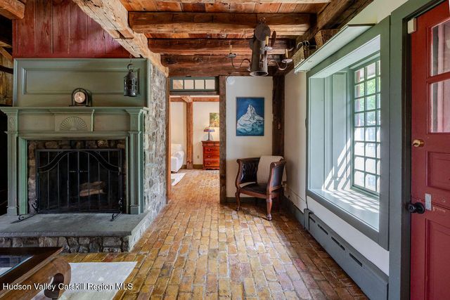 a view of livingroom with furniture window and fireplace