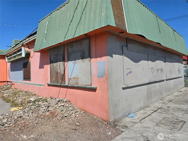 a front view of a house with stairs