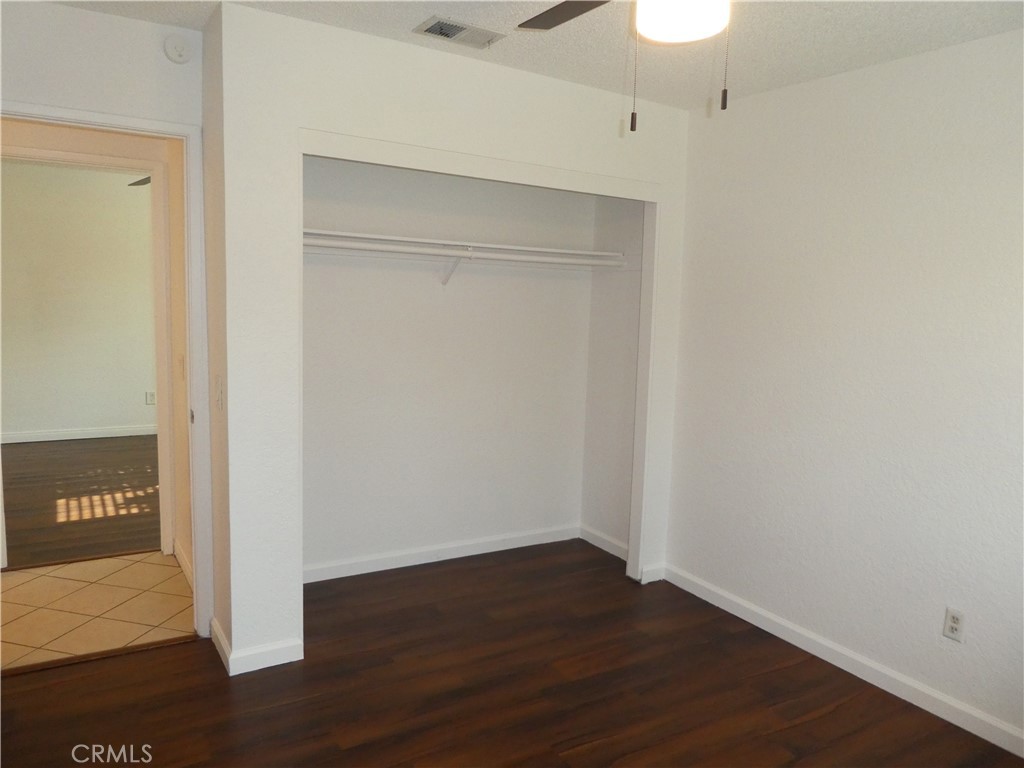3842 Ridge Road Riverside, CA 92501 - Photo 13 of 26 a view of empty room with wooden floor