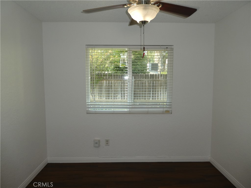 3842 Ridge Road Riverside, CA 92501 - Photo 16 of 26 a view of an empty room with a window