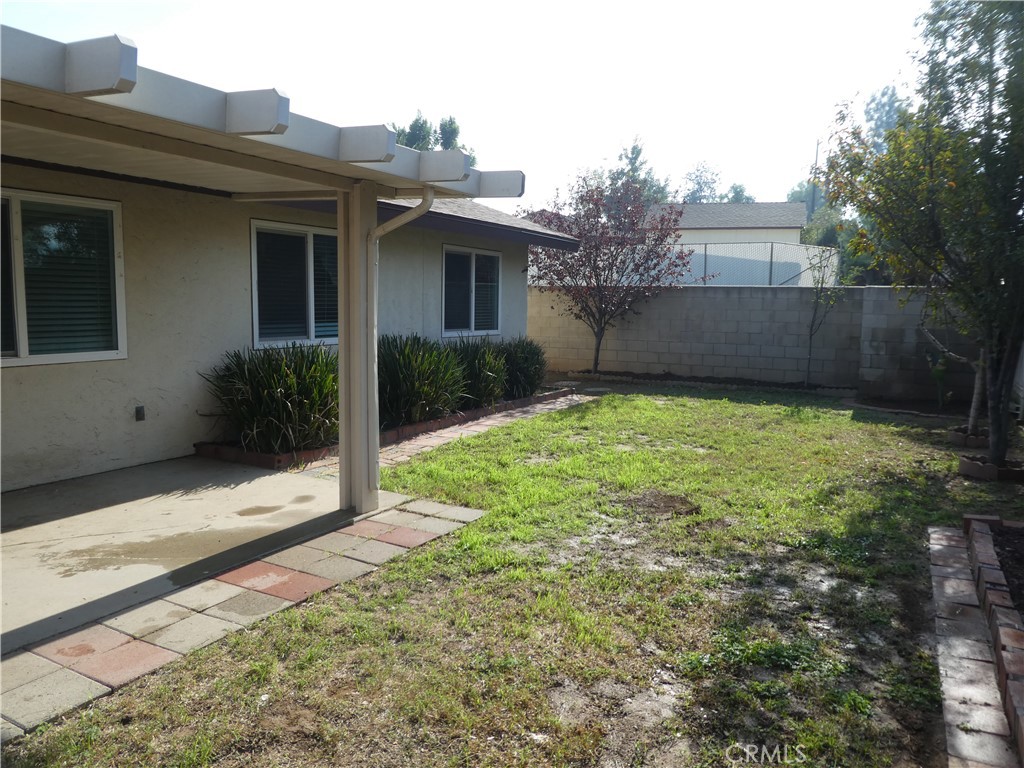3842 Ridge Road Riverside, CA 92501 - Photo 19 of 26 a view of a house with a yard
