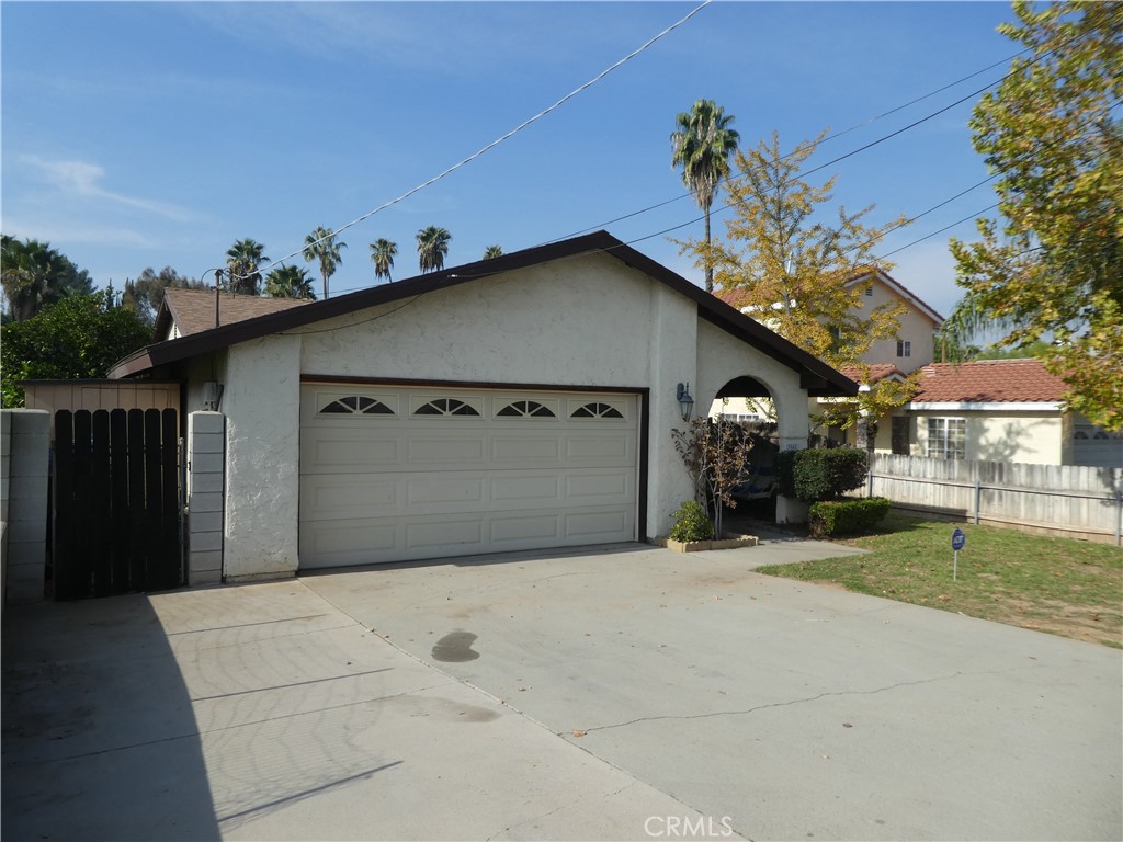 3842 Ridge Road Riverside, CA 92501 - Photo 2 of 26 a view of a house with a garage