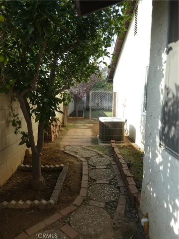 a view of a backyard with sitting area