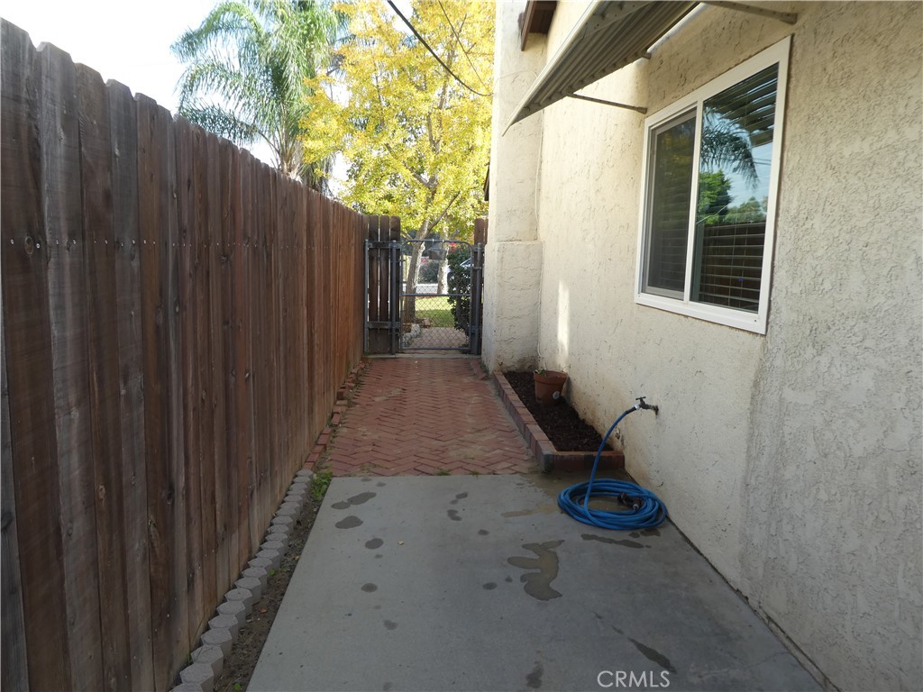3842 Ridge Road Riverside, CA 92501 - Photo 26 of 26 a view of a backyard with wooden fence