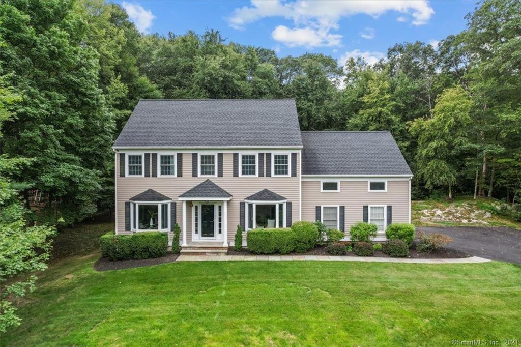 585 Barrack Hill Road Ridgefield, CT 06877 - Photo 1 of 1 front view of a house with a yard