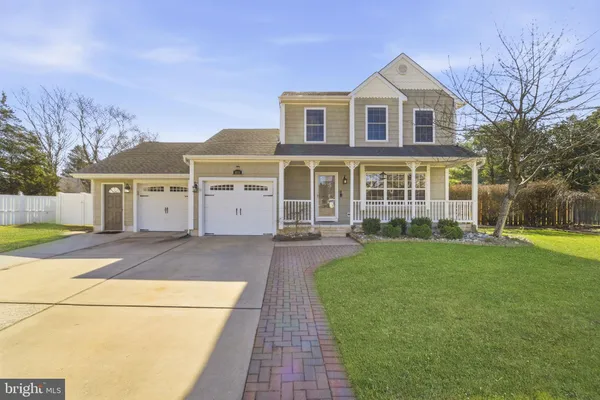a front view of house with yard