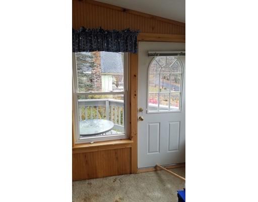 308 Beaver Lake Road Ware, MA 01082 - Photo 15 of 24 a living room with a large window and furniture