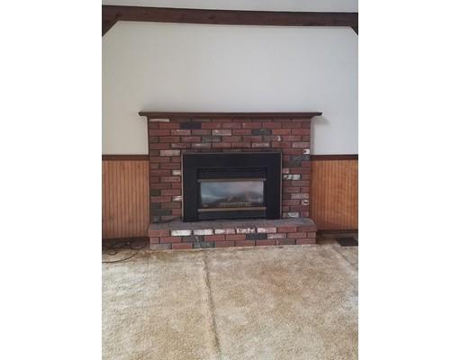 308 Beaver Lake Road Ware, MA 01082 - Photo 19 of 24 a living room with a fireplace
