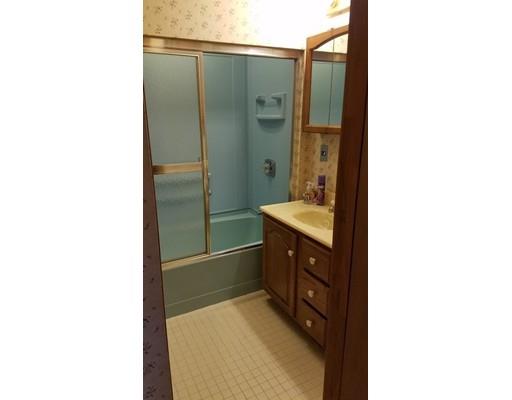 308 Beaver Lake Road Ware, MA 01082 - Photo 21 of 24 a bathroom with a double vanity sink and mirror