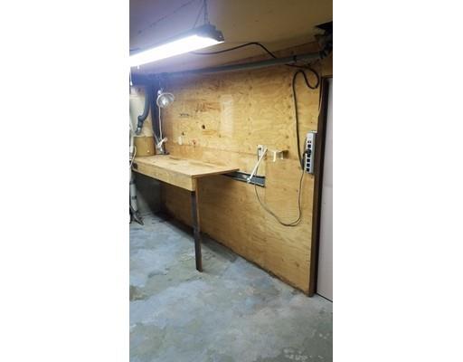 308 Beaver Lake Road Ware, MA 01082 - Photo 24 of 24 a bathroom with a sink and mirror