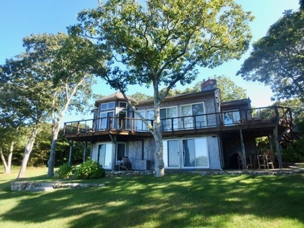 29 Cemetery Road Chilmark, MA 02535 - Photo 2 of 32 a view of a house with a yard and sitting area