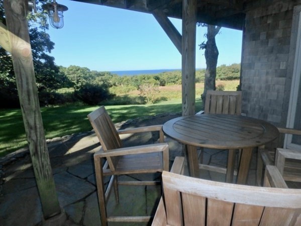 29 Cemetery Road Chilmark, MA 02535 - Photo 27 of 32 a view of balcony with wooden floor and outdoor seating