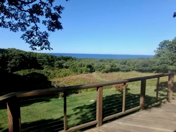 a view of a balcony with lake view