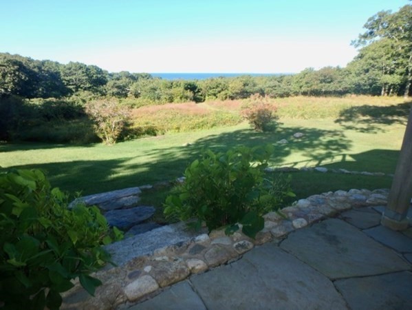 29 Cemetery Road Chilmark, MA 02535 - Photo 31 of 32 a view of a lake with a yard