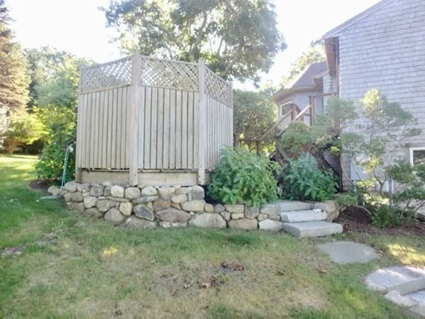 a view of a back yard of the house