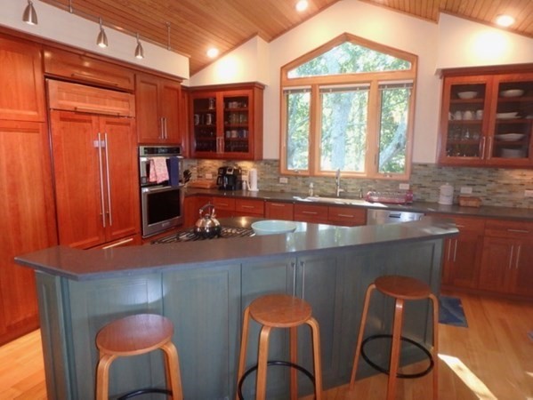 29 Cemetery Road Chilmark, MA 02535 - Photo 5 of 32 a dining table chair next to a window